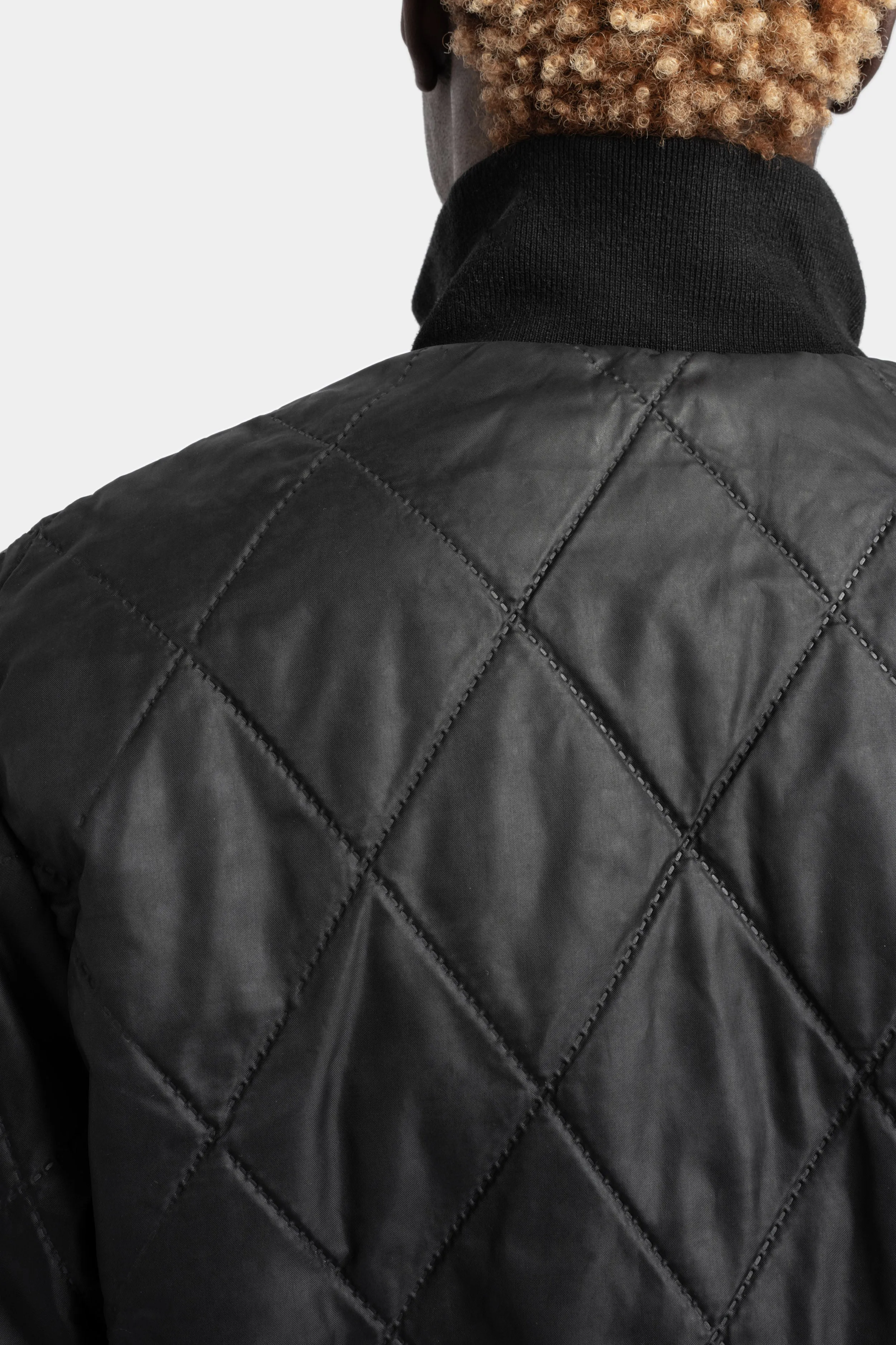 Coated reversible bomber jacket